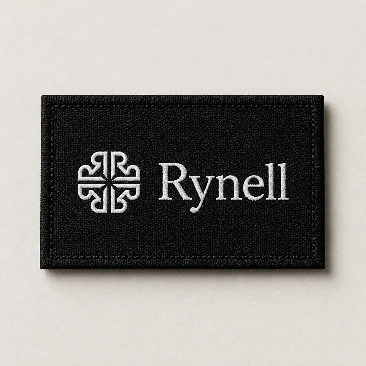 Black embroidered Rynell patch